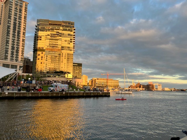 This image shows the Baltimore waterfront at sunset
